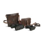 TWO PAIRS OF VINTAGE BINOCULARS, each contained within fitted leather case