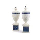 A PAIR OF ITALIAN MARBLE URNS, of classical form with lapis lazuli finals and banding, raised on