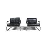 RODNEY KINSMAN A pair of OMK T2 armchairs by Rodney Kinsman, with leather seats, c.1970.