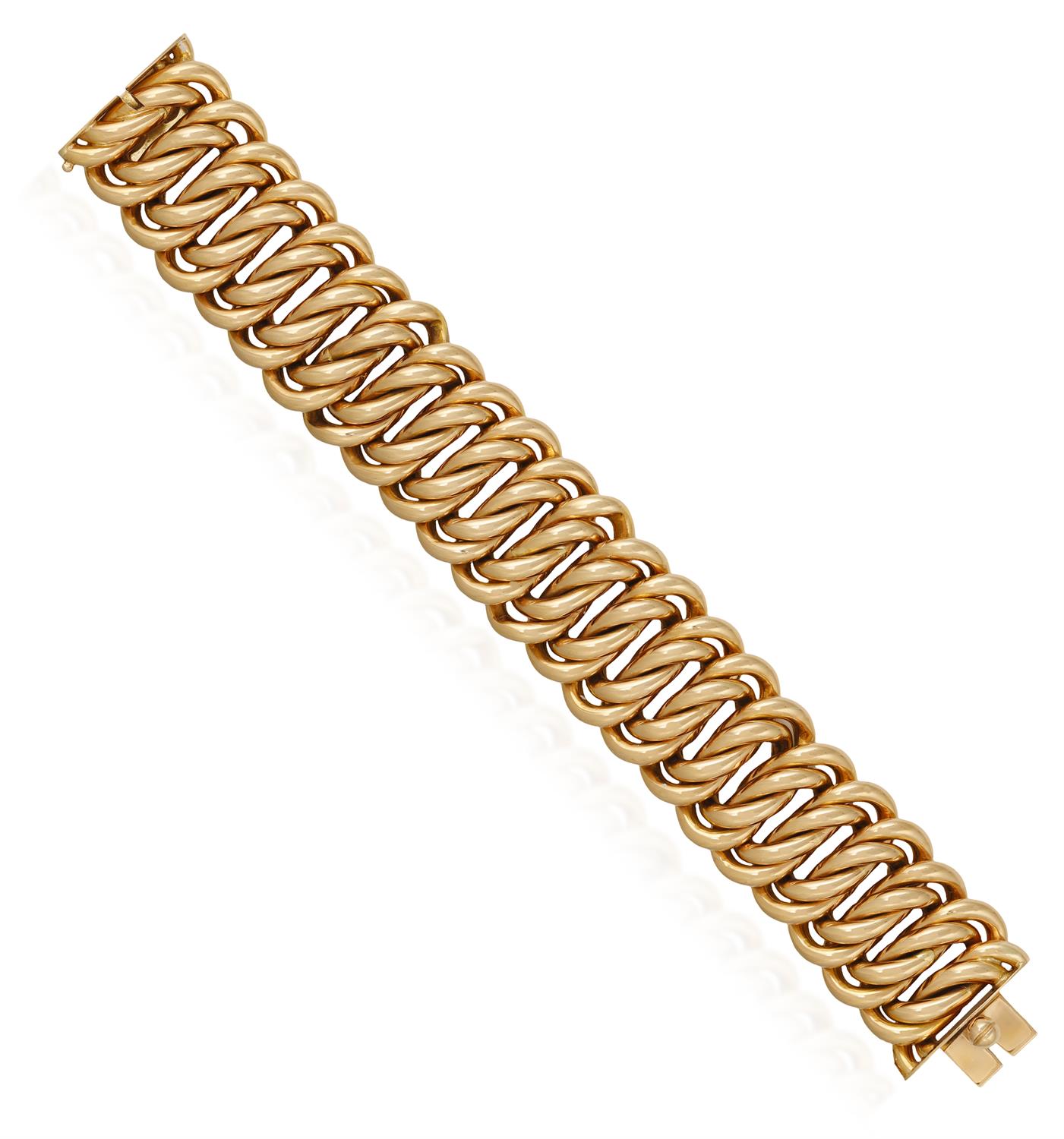 A RETRO GOLD BRACELET, ITALIAN, CIRCA 1940 The large articulated bracelet, of openwork design