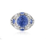 AN EARLY 20TH CENTURY SAPPHIRE AND DIAMOND DRESS RING, CIRCA 1920 The openwork domed top set at