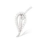 A DIAMOND BROOCH, BY MAUBOUSSIN, CIRCA 1960 The stylised leaf with openwork design,