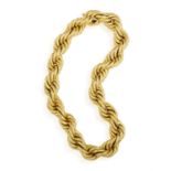 A GOLD NECKLACE The large polished gold twisted necklace with secret clasp, in 18K gold,