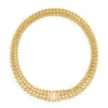 A GOLD AND DIAMOND 'PENELOPE' NECKLACE, BY CARTIER, CIRCA 1990 Composed of a woven gold chain,