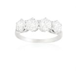 From the private collection of a continental lady A DIAMOND FOUR-STONE RING Set with four