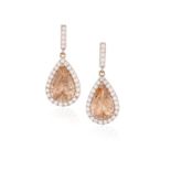 A PAIR OF MORGANITE AND DIAMOND PENDENT EARRINGS Each pear-shaped morganite within a surround of