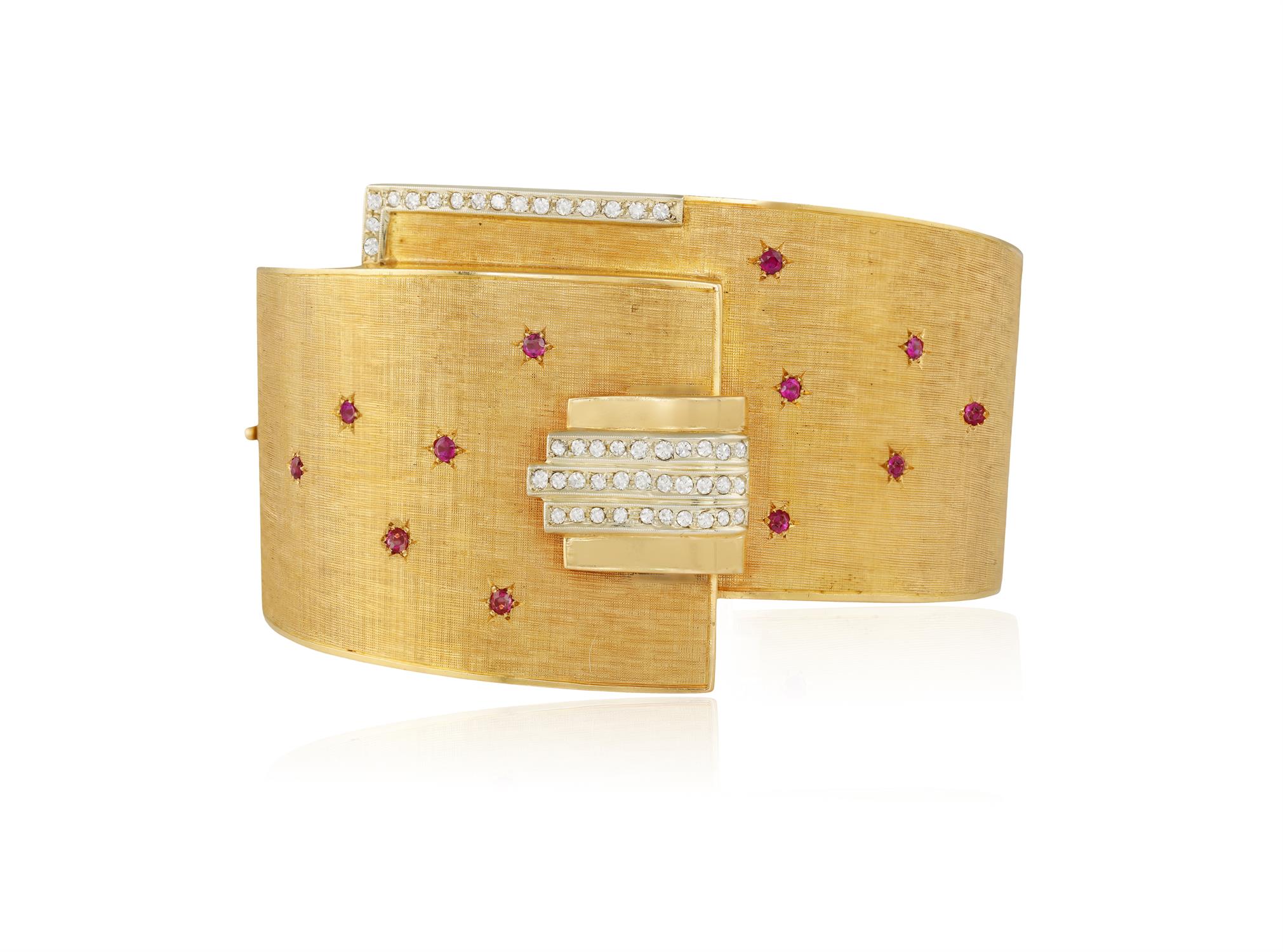 A RETRO RUBY AND DIAMOND BANGLE, CIRCA 1945 The hinged textured bangle highlighted with - Image 2 of 6