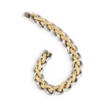 A GOLD AND SILVER BRACELET, BY HERMÈS Composed of a fancy-link silver chain, centring further