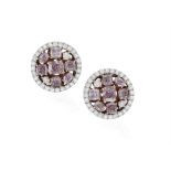 A PAIR OF COLOURED DIAMOND AND DIAMOND EARSTUDS Of openwork bombé design, centrally set with