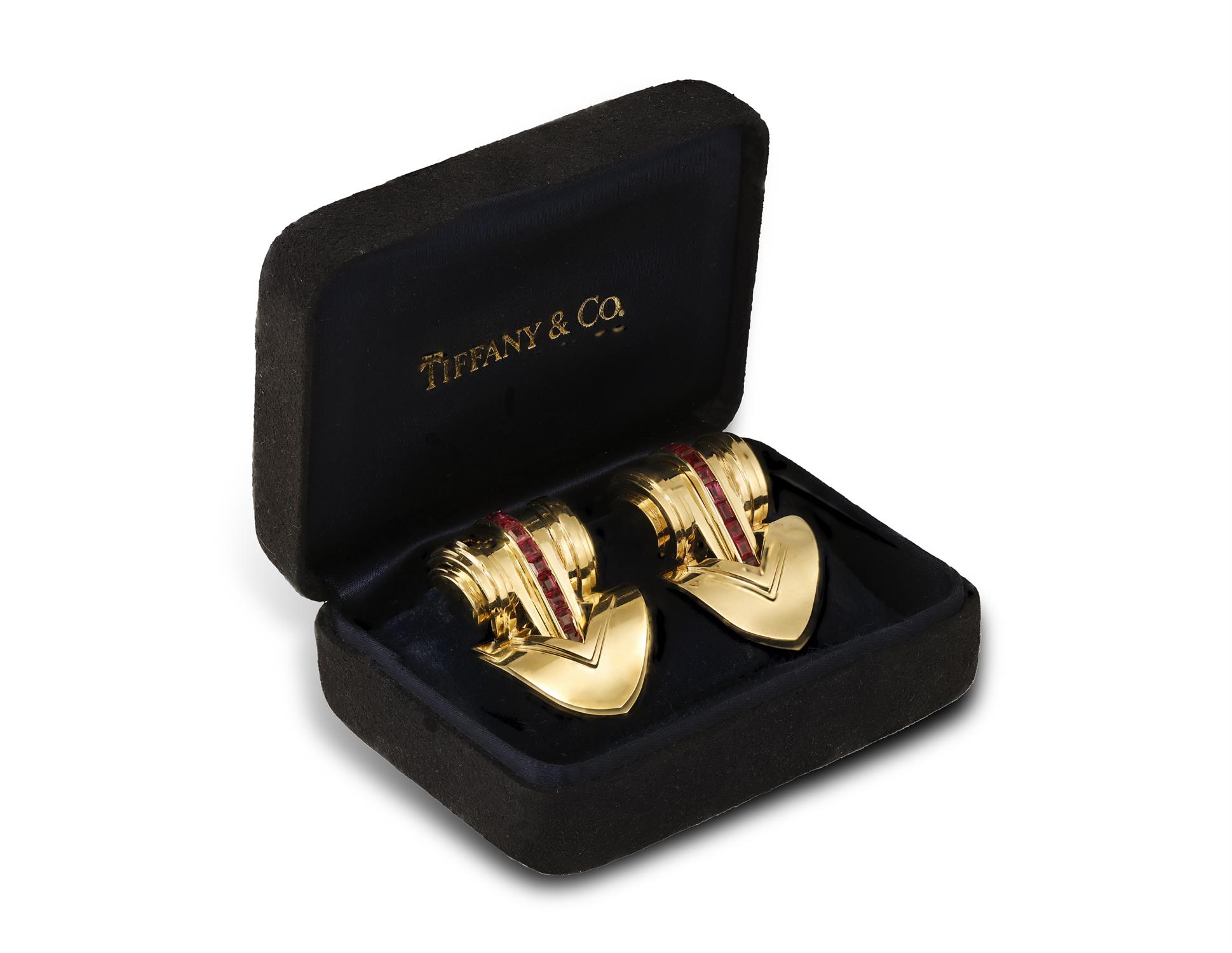 A PAIR OF RETRO CLIP BROOCHES, BY TIFFANY & CO., CIRCA 1940 Each designed as a polished gold