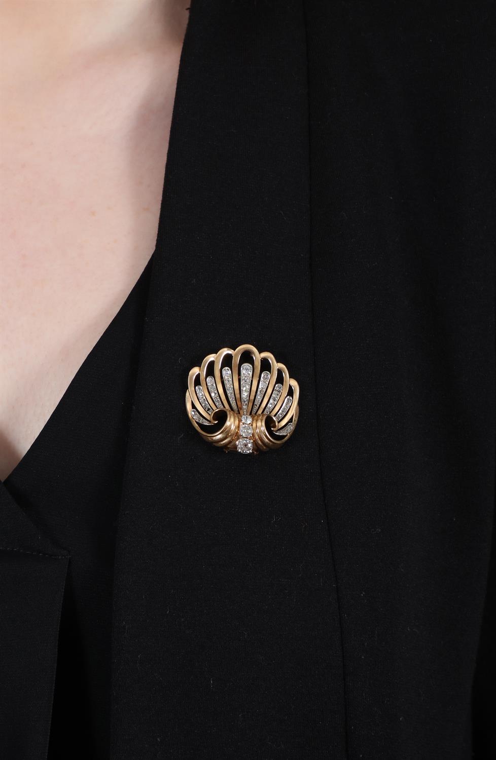 A RETRO DIAMOND BROOCH, FRENCH, CIRCA 1945 Modelled as an openwork shell with fluted scrolling - Image 3 of 4