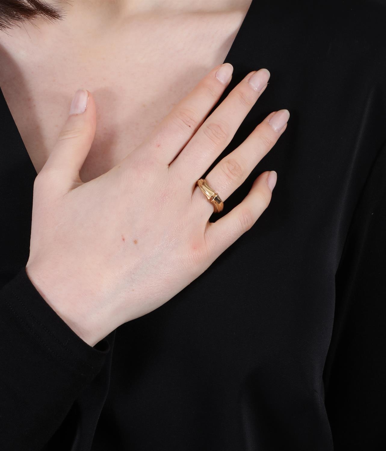 A GOLD 'BAMBOO' RING, BY CARTIER, CIRCA 1995 Designed as a tapered row of polished textured - Image 5 of 6