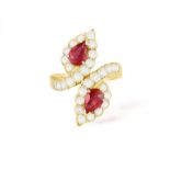 A RUBY AND DIAMOND 'TOI ET MOI' RING, BY VAN CLEEF & ARPELS Of crossover design,