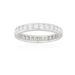 A DIAMOND ETERNITY RING, BY CARTIER The continuous line of brilliant-cut diamonds within