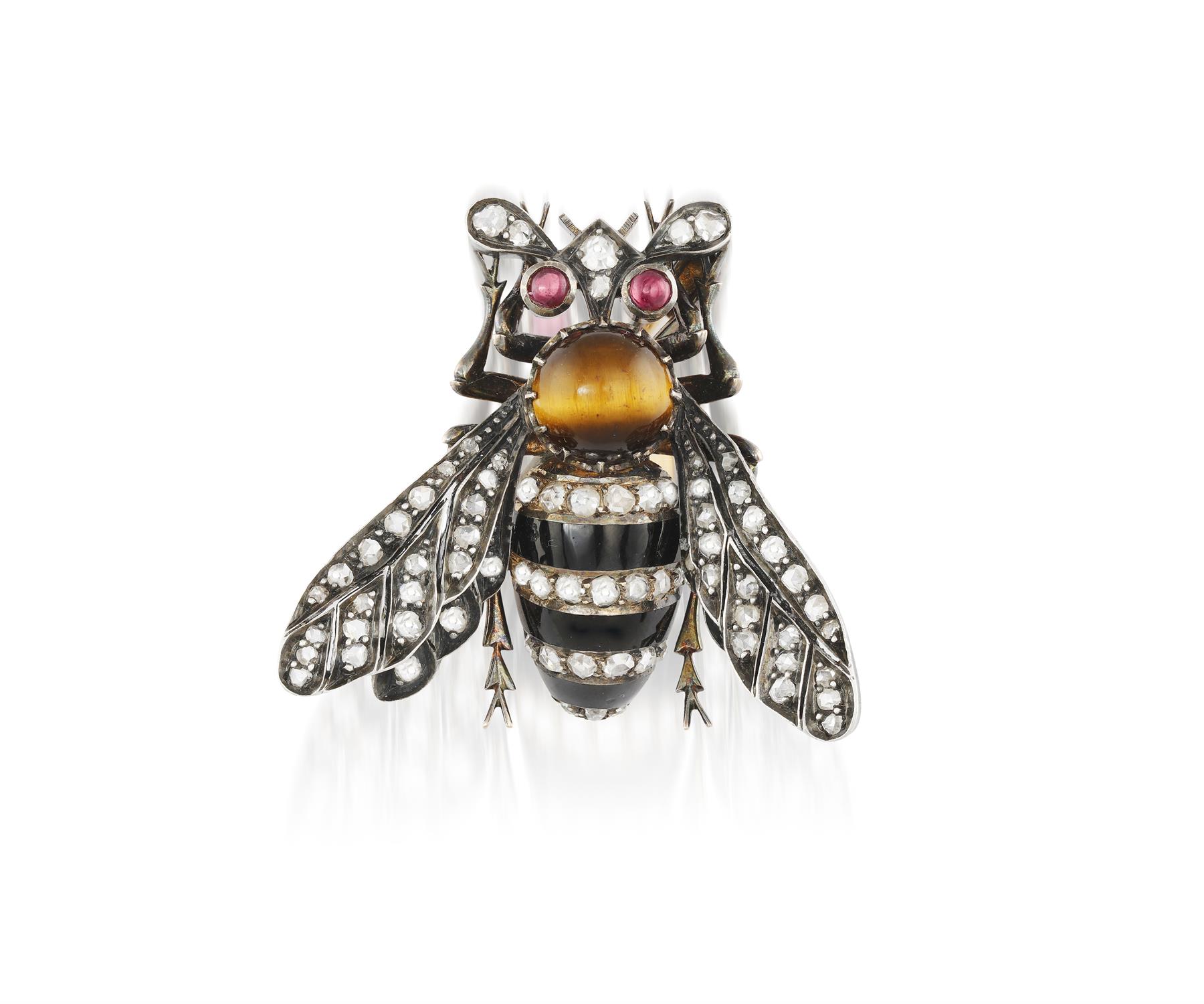 A LATE 19TH CENTURY BUMBLEBEE BROOCH, CIRCA 1880 The thorax formed as a cabochon tiger's eye,