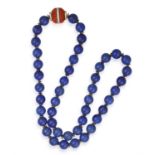 From the private collection of a continental lady A LAPIS LAZULI BEAD SAUTOIR NECKLACE WITH