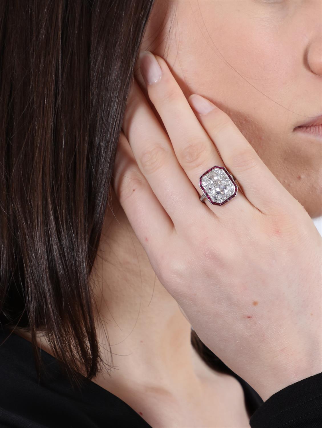 AN EARLY 20TH CENTURY DIAMOND AND RUBY DRESS RING, CIRCA 1925 The octagonal plaque centring an - Image 6 of 6