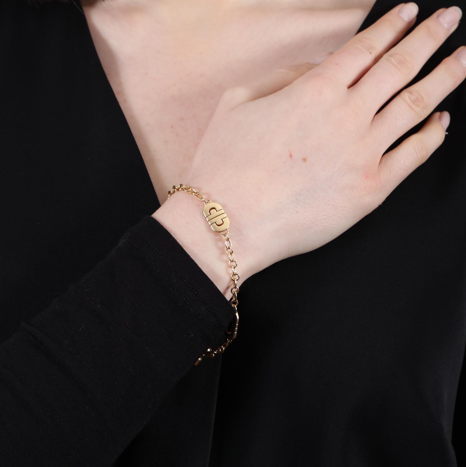 A GOLD 'PARENTESI' BRACELET, BY BULGARI The cable-link chain interspersed with three gold - Image 5 of 6