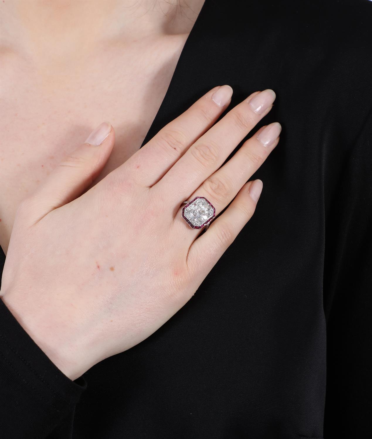 AN EARLY 20TH CENTURY DIAMOND AND RUBY DRESS RING, CIRCA 1925 The octagonal plaque centring an - Image 5 of 6