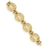 A RETRO GOLD BRACELET, BY CARLO WEINGRILL FOR BULGARI, CIRCA 1950 Designed as a series of