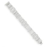 AN IMPORTANT DIAMOND BRACELET, FRENCH, CIRCA 1950 Of openwork geometric design,