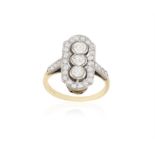 A DIAMOND DRESS RING, composed of a trio European-cut diamonds within collet-setting,