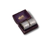 A PAIR OF LATE 19TH CENTURY RUSSIAN SILVER NAPKIN RINGS BY KARL FABERGE, (c.2.2 troy ozs). 4.