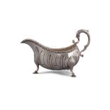 A LARGE GEORGE III IRISH SILVER SAUCEBOAT, Dublin c.1770, makers mark of William Thompson,