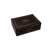 A REGENCY ROSEWOOD AND BRASS INLAID RECTANGULAR WRITING BOX, the hinged cover decorated with cut