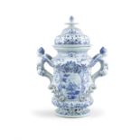 A DUTCH BLUE AND WHITE DELFT VASE AND COVER, the detachable top with bud finial, waisted neck,