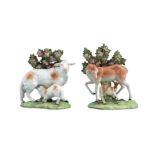 A PAIR OF CHELSEA STYLE BROCADE PORCELAIN GROUPS, modelled as dear and a fawn standing against a