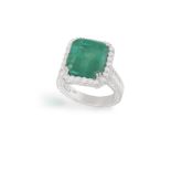 AN EMERALD AND DIAMOND DRESS RING, the cut-cornered rectangular-cut emerald weighing approximately