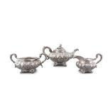 A SILVER THREE PIECE TEA SET, Dublin c.1830, mark of Smith & Gamble, comprising a teapot,