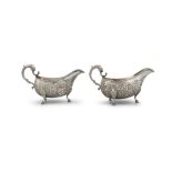 A PAIR OF IRISH HELMET SHAPED SAUCE BOATS, Dublin 1786, maker's mark of Thomas James,