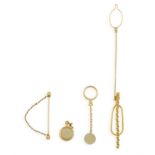 A GROUP OF GENTLEMAN'S GOLD JEWELLERY, including two 18K gold tie holders, a pair of 18K gold