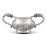 AN ELEPHANT HANDLED AND REPOUSSE ANGLO INDIAN RAJ SILVER ‘HUNTING’ TROPHY CUP BEARING A MARK