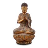 AN IMPORTANT AND LARGE GILT AND RED LACQUERED WOODEN SCULPTURE OF A SEATED BUDDHA AMITABHA