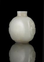 A JADE SNUFF BOTTLE CHINA, LATE QING DYNASTY Resting on a short ring foot, with a flattened egg-