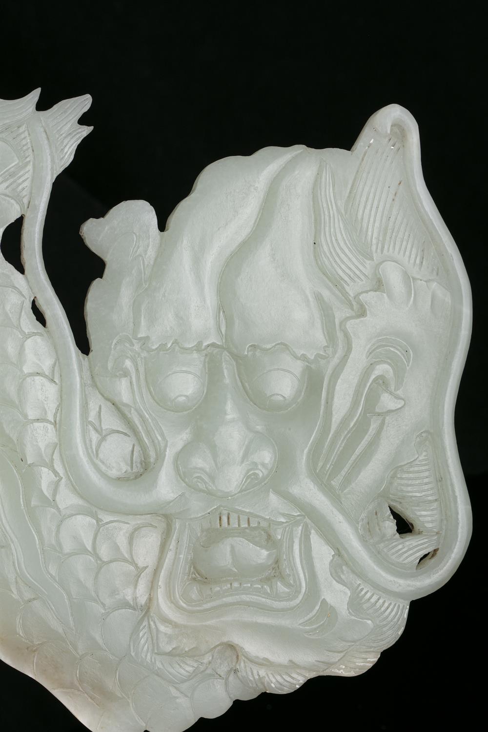 A PALE CELADON JADE ‘DRAGON’ ORNAMENTAL PLAQUE CHINA, LATE QING DYNASTY, 19TH CENTURY This piece - Image 3 of 11