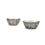 A PAIR OF RETICULATED CHINESE EXPORT SILVER ‘DRAGON’ BOWLS BY HUNG CHONG & CO CHINA, CANTON /