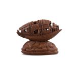 AN OLIVE PIT CARVING OF A 'PLEASURE BOAT' IN THE MANNER OF GUCHENG 谷生作 China, Late Qing Dynasty to