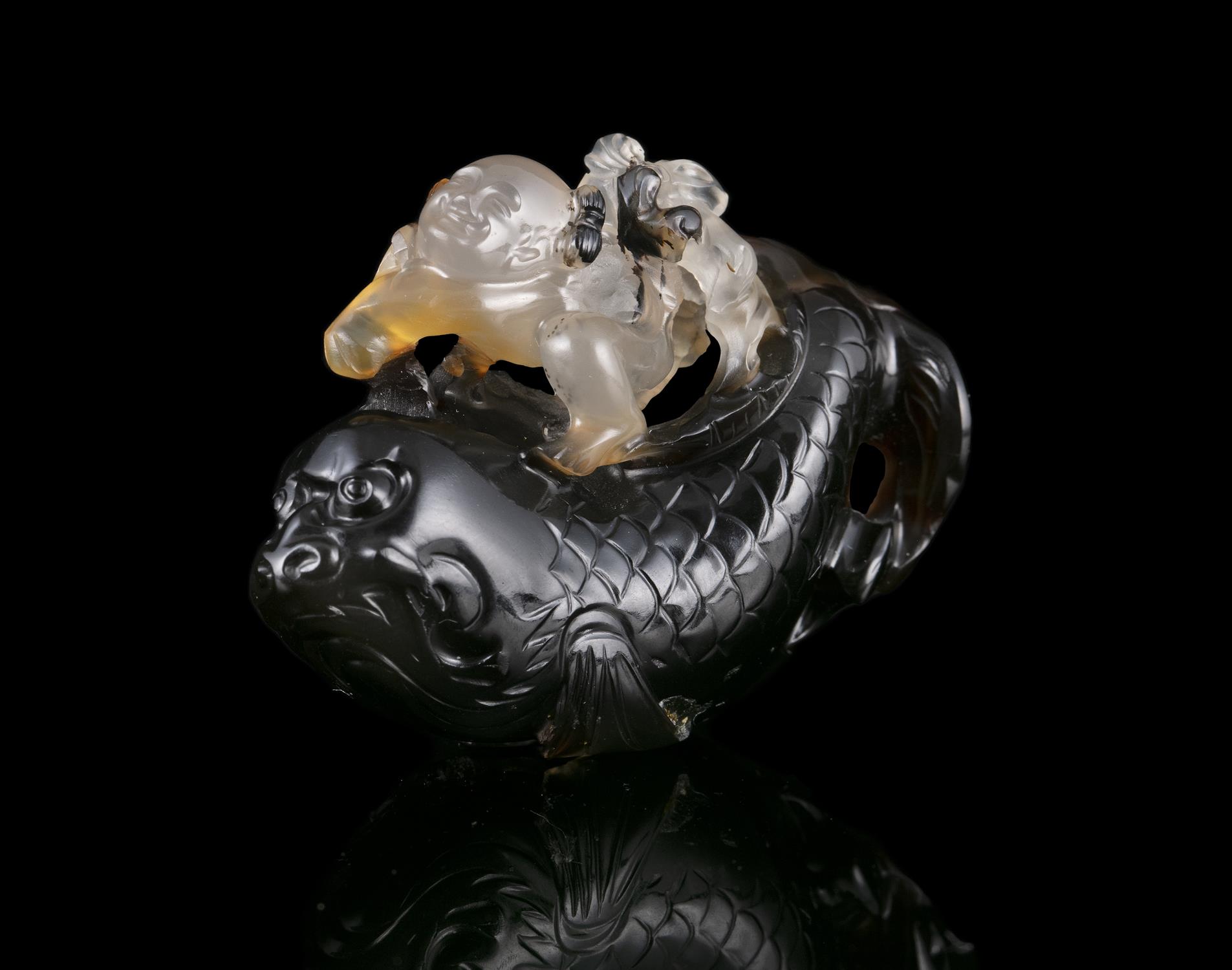 PROPERTIES FROM A FRENCH COLLECTOR OF JADE CARVINGS AND SNUFFBOTTLES A POSSIBLY SUZHOU AGATE GROUP