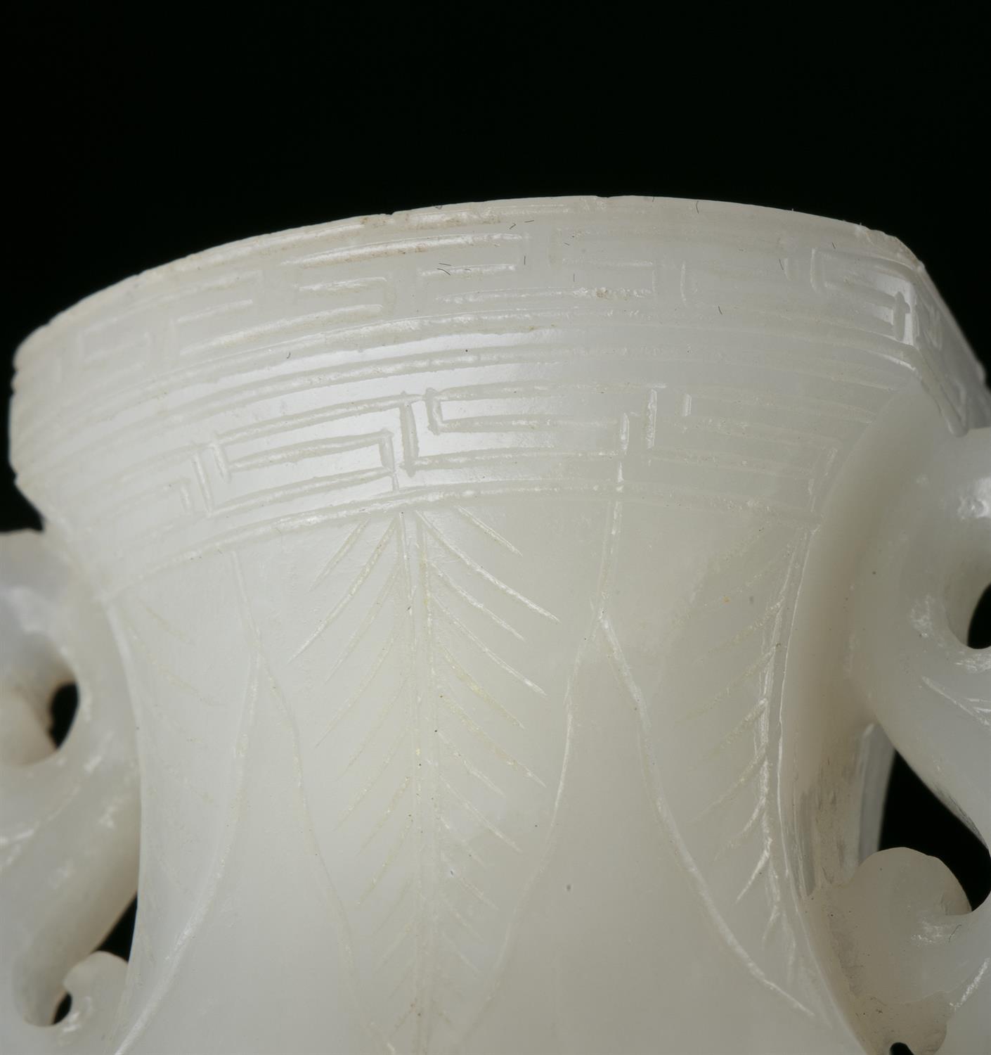 A WHITE JADE ‘TAOTIE MASK’ JOYSTICK HOLDER OF ARCHAISTIC GU SHAPE CHINA, QING DYNASTY Of - Image 5 of 9