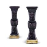 A PAIR OF AUBERGINE AND YELLOW GLAZED BISCUIT PORCELAIN BEAKER VASES OF ARCHAISTIC GU SHAPE CHINA,