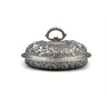 A LARGE AND HEAVY CHINESE EXPORT SILVER ‘HUNDRED FLOWERS’ TUREEN AND COVER BY C.J. & CO CHINA,