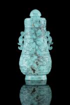 A SMALL TURQUOISE MATRIX ARCHAISTIC LIDDED VASE OF ARCHAISTIC HU SHAPE CHINA, LATE QING DYNASTY,