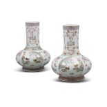 A PAIR OF FAMILLE ROSE ‘DEER AND FUNGUS’ PORCELAIN BOTTLE VASES, TIANQIUPING APOCRYPHAL MARK OF