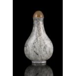 PROPERTIES FROM A FRENCH COLLECTOR OF JADE CARVINGS AND SNUFFBOTTLES A CHICKEN BONE JADE PEAR-SHAPED