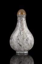 PROPERTIES FROM A FRENCH COLLECTOR OF JADE CARVINGS AND SNUFFBOTTLES A CHICKEN BONE JADE PEAR-SHAPED