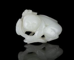 PROPERTIES FROM A FRENCH COLLECTOR OF JADE CARVINGS AND SNUFFBOTTLES A WHITE JADE CARVING OF A